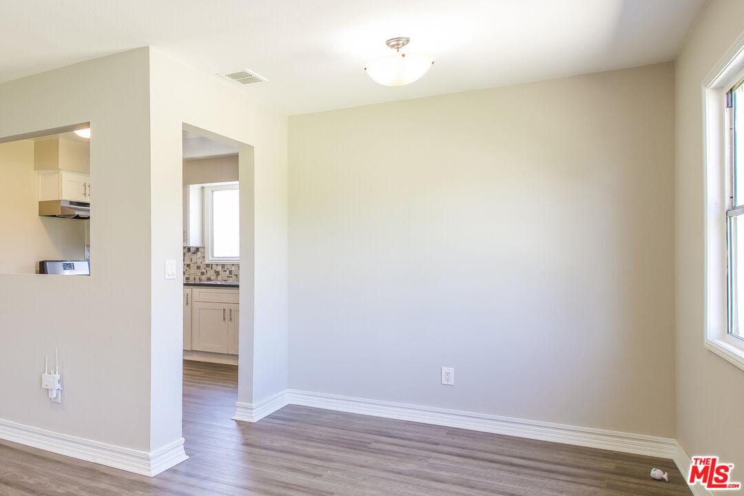 13014 Chestnut Avenue Rancho Cucamonga, CA 91739 - Photo 11 of 25 wooden floor in an empty room