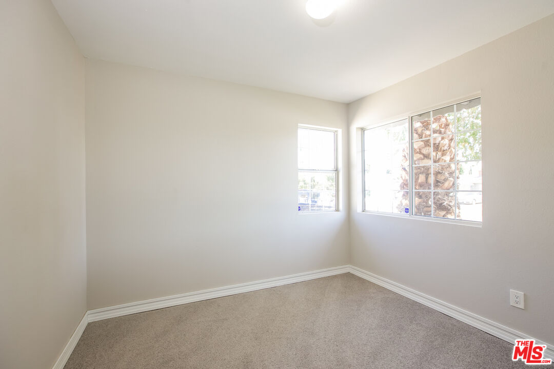 13014 Chestnut Avenue Rancho Cucamonga, CA 91739 - Photo 16 of 25 an empty room with a window