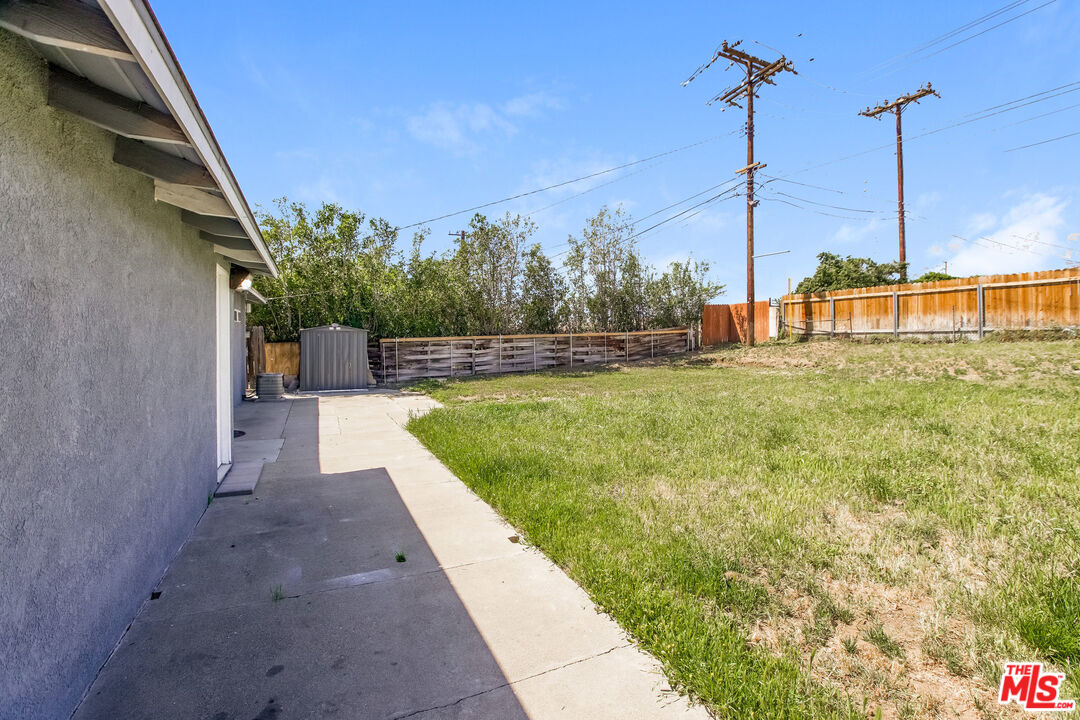 13014 Chestnut Avenue Rancho Cucamonga, CA 91739 - Photo 20 of 25 a view of a backyard with a lake view