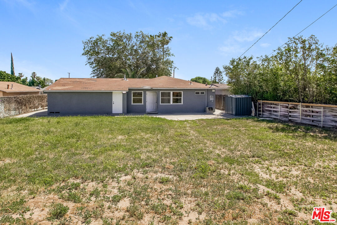 13014 Chestnut Avenue Rancho Cucamonga, CA 91739 - Photo 24 of 25 a view of a house with a yard