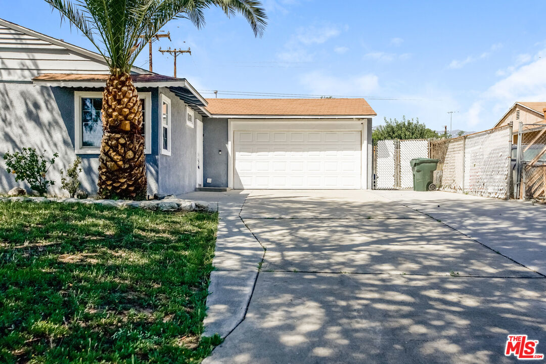 13014 Chestnut Avenue Rancho Cucamonga, CA 91739 - Photo 6 of 25 a view of a house with a yard