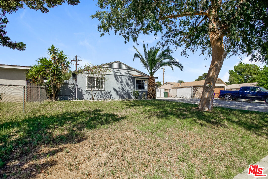 13014 Chestnut Avenue Rancho Cucamonga, CA 91739 - Photo 7 of 25 a front view of a house with garden