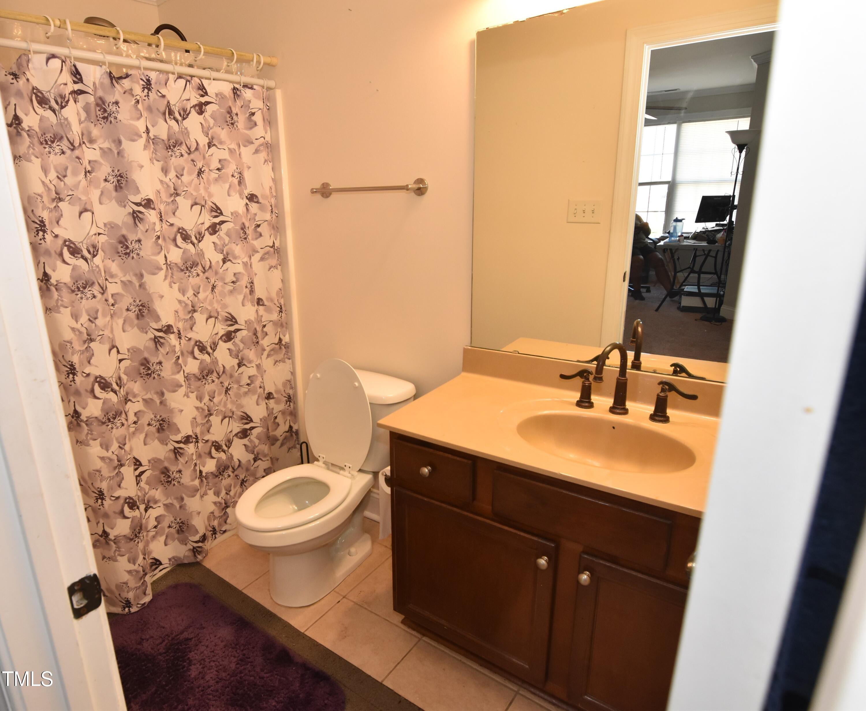 2701 Erinridge Road Raleigh, NC 27610 - Photo 11 of 19 Upstairs bathroom