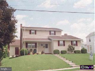 1434 Liberty Avenue Reading, PA 19607 - Photo 1 of 1 front view of a house with a yard