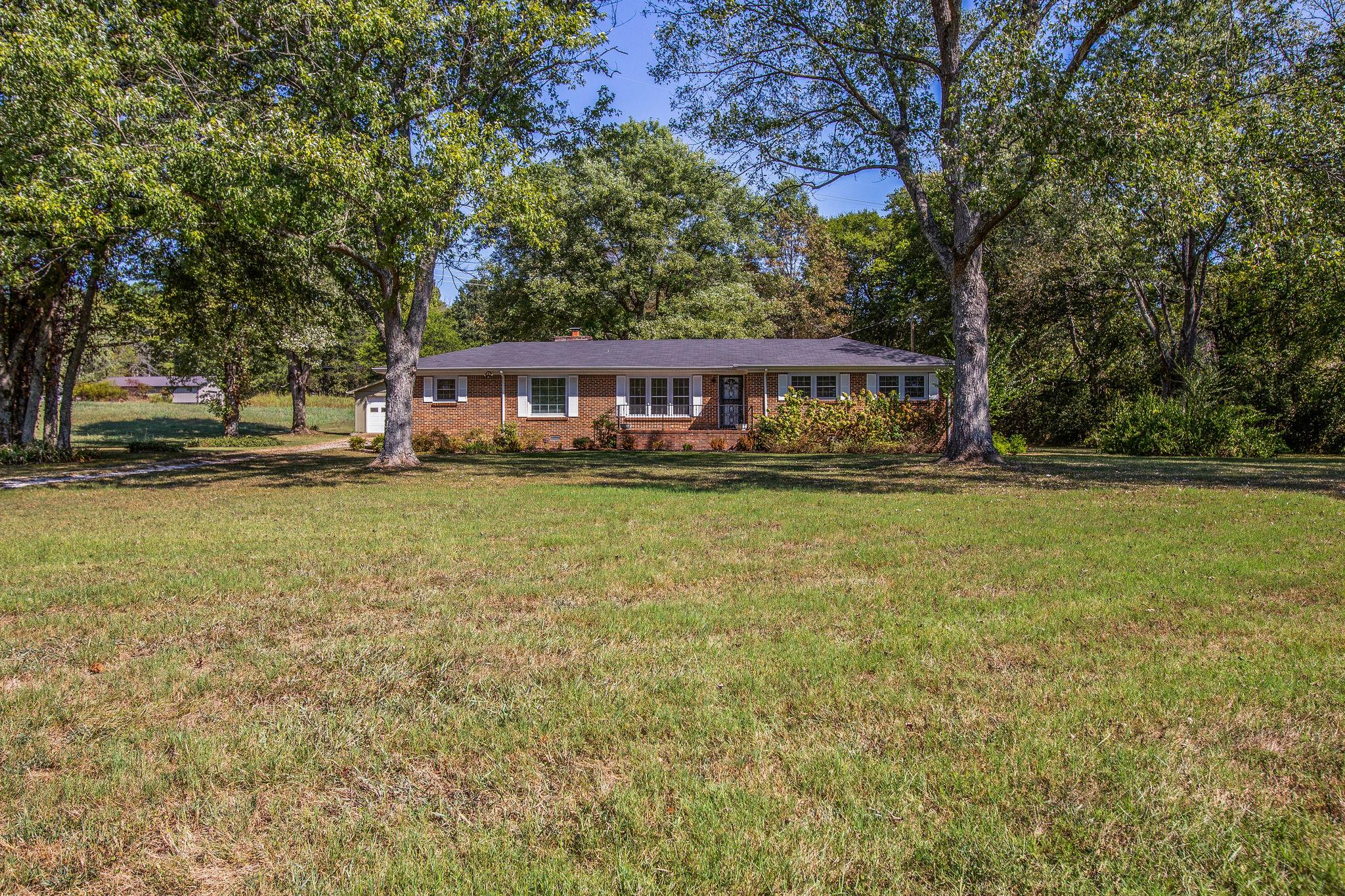 2173 Double Branch Road Columbia, TN 38401 - Photo 2 of 17 a view of a house with a yard and sitting area