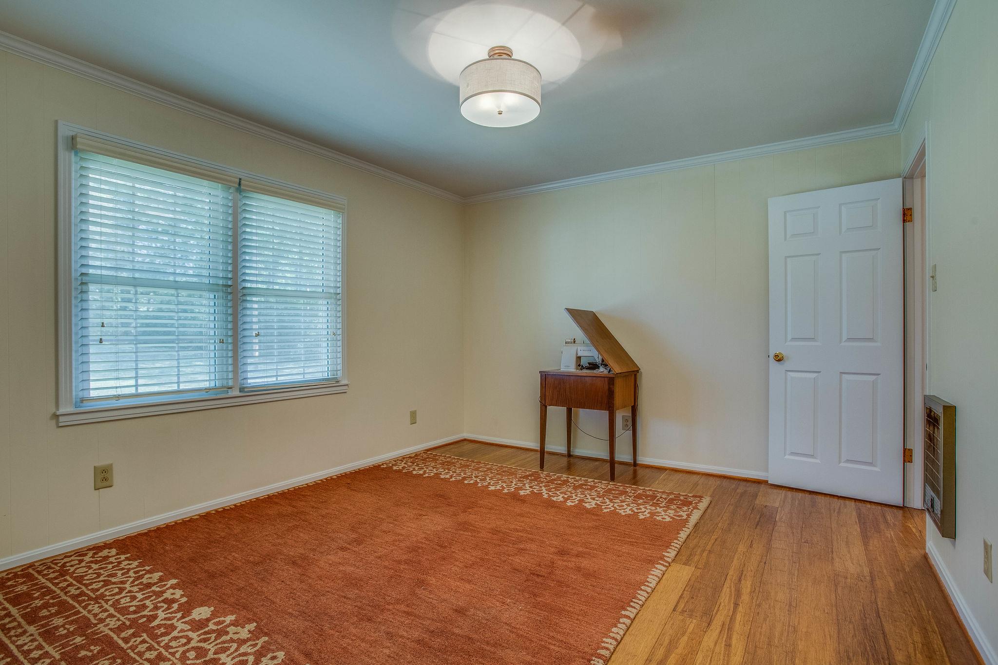 2173 Double Branch Road Columbia, TN 38401 - Photo 5 of 17 a view of a livingroom with wooden floor and a window