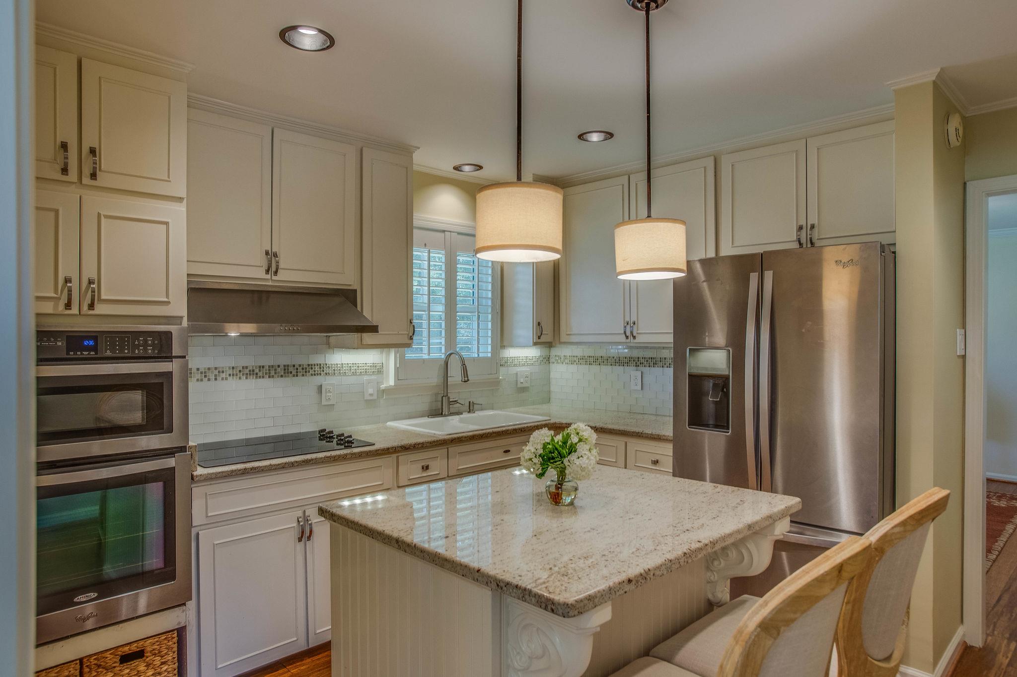 2173 Double Branch Road Columbia, TN 38401 - Photo 6 of 17 a kitchen with refrigerator and cabinets