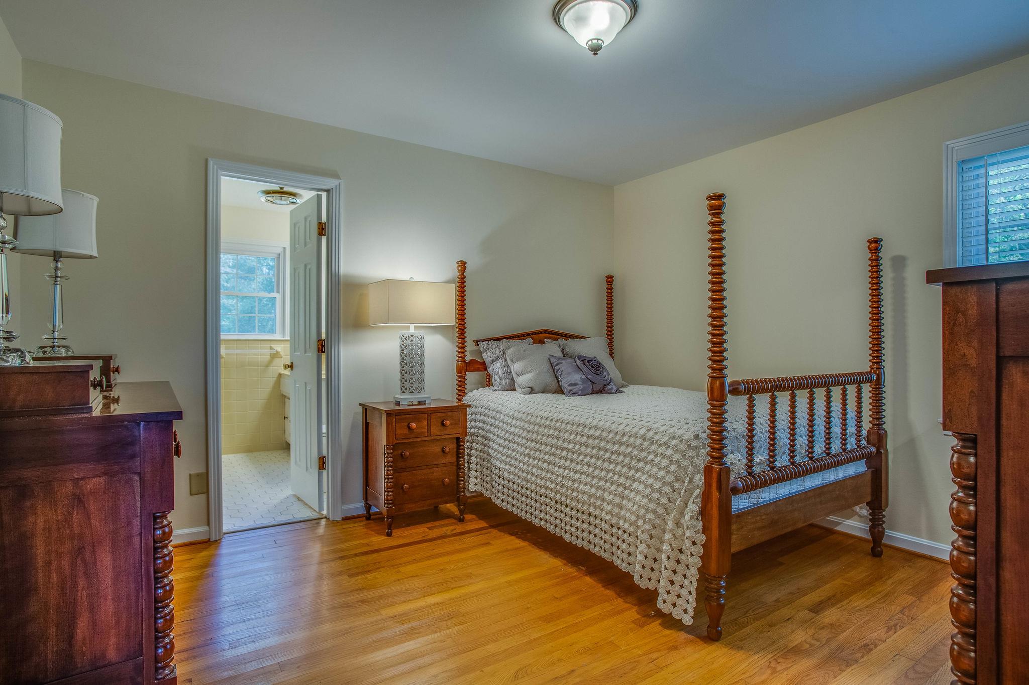 2173 Double Branch Road Columbia, TN 38401 - Photo 9 of 17 a bedroom with a bed and wooden floor