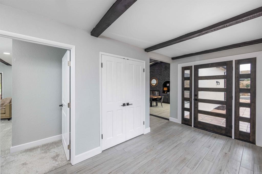32404 Womsi Road Pauma Valley, CA 92061 - Photo 4 of 34 wooden floor and windows in a room