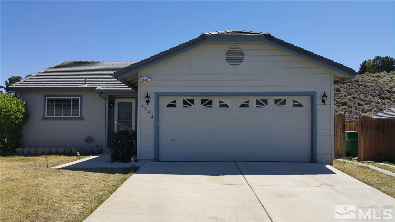 4692 Goodwin Road Sparks, NV 89436 - Photo 1 of 1 a front view of a house with a garage