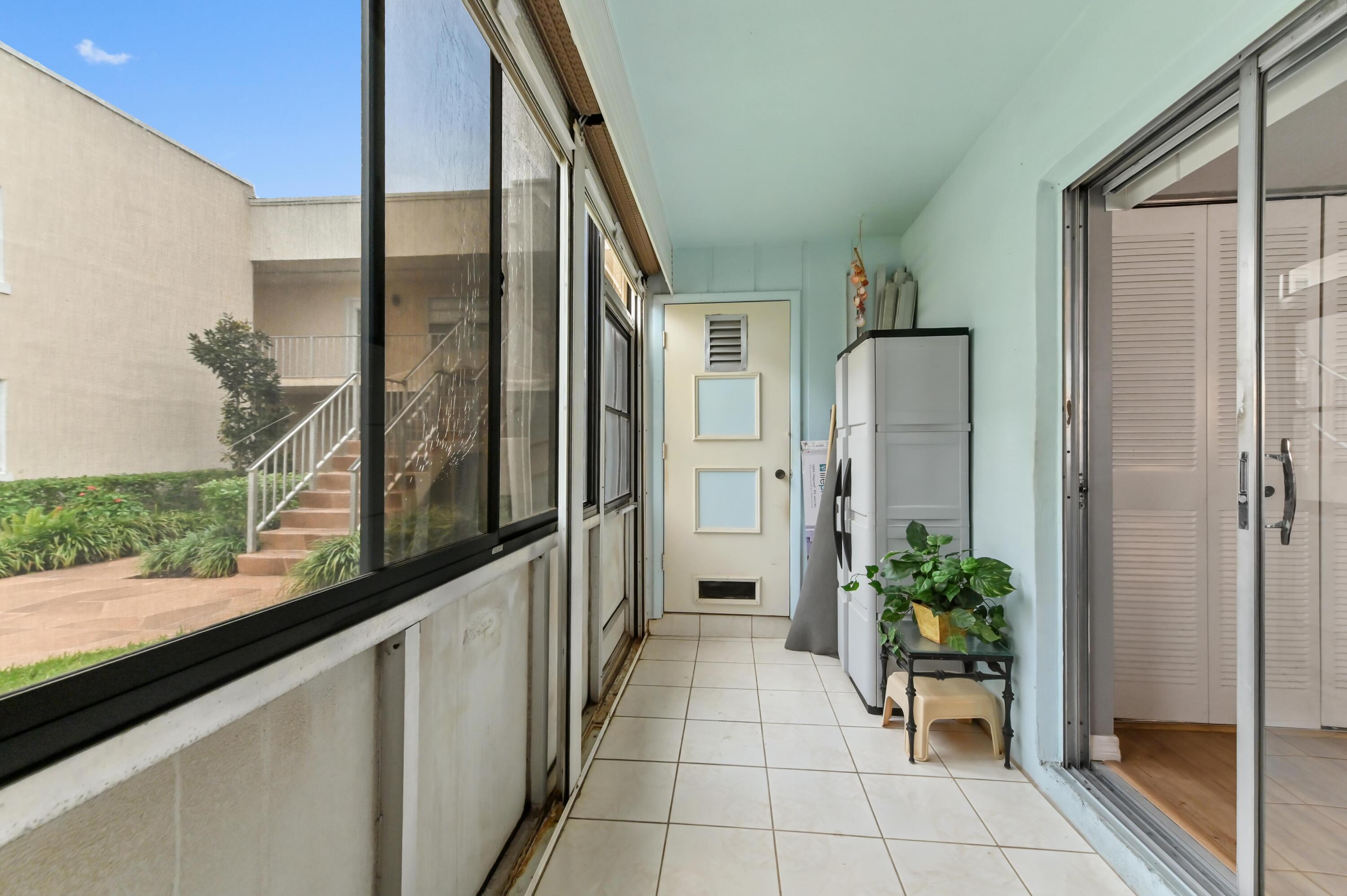 302 Capri G Delray Beach, FL 33484 - Photo 21 of 36 27 Sunroom 02