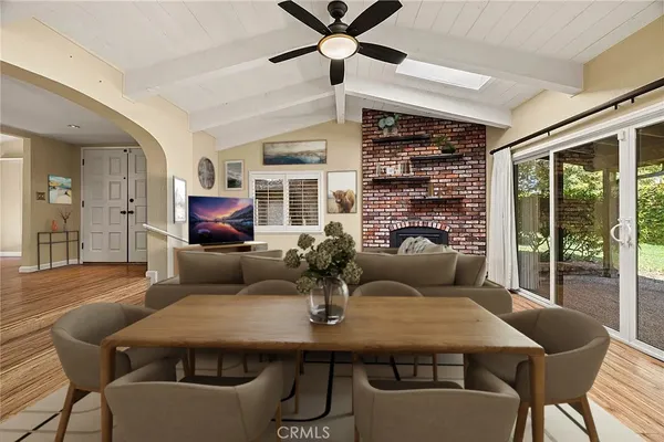 a view of a livingroom with wooden floor