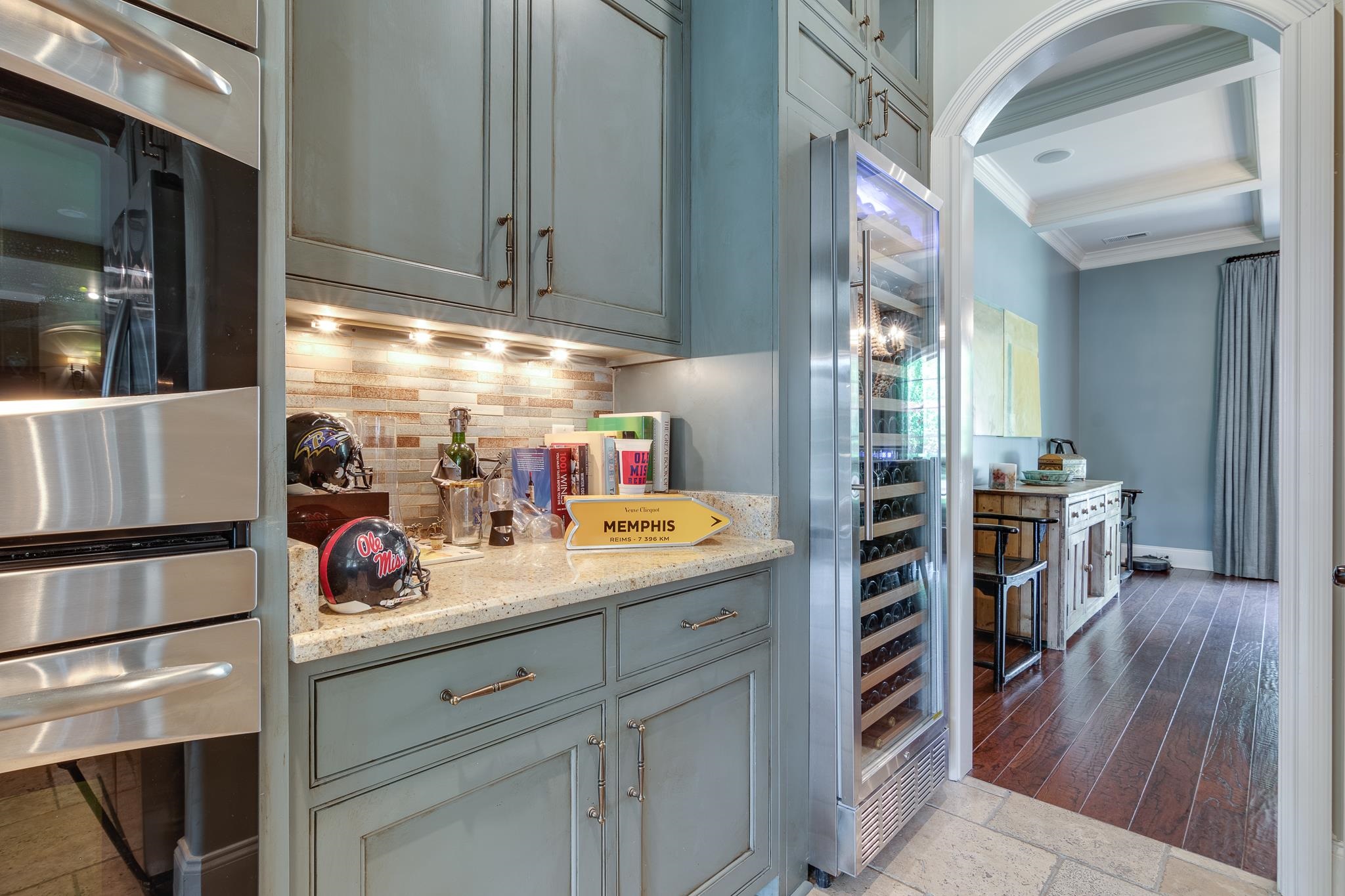 5245 Cole Road Memphis, TN 38120 - Photo 16 of 25 a kitchen with a refrigerator and sink