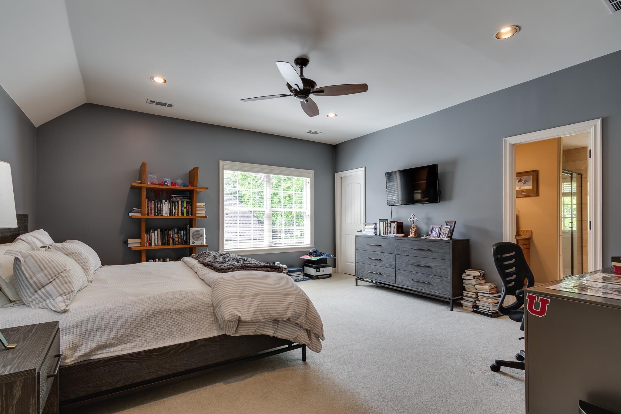 5245 Cole Road Memphis, TN 38120 - Photo 20 of 25 a bedroom with a bed furniture and a flat screen tv