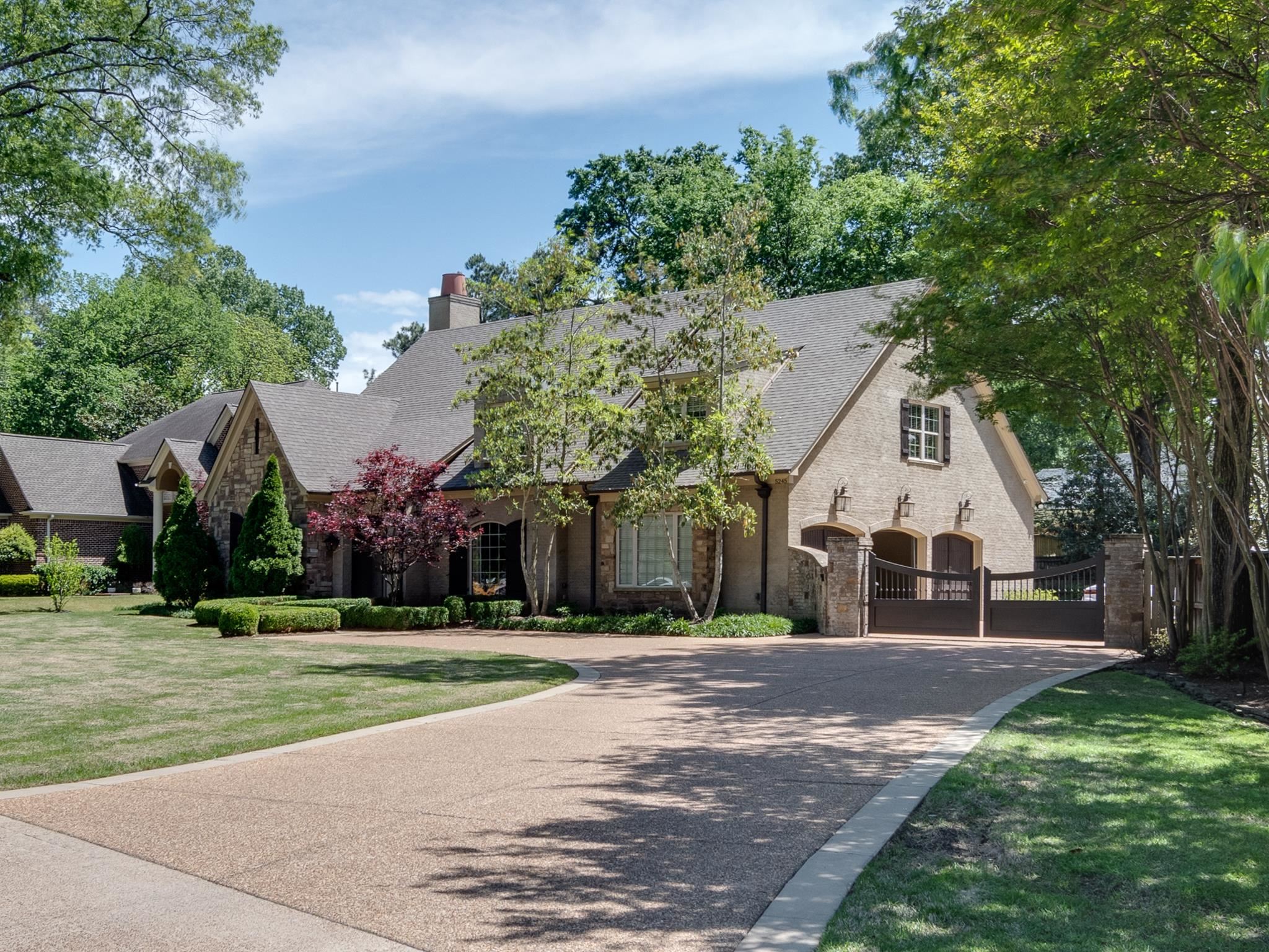 5245 Cole Road Memphis, TN 38120 - Photo 2 of 25 a front view of a house with a yard