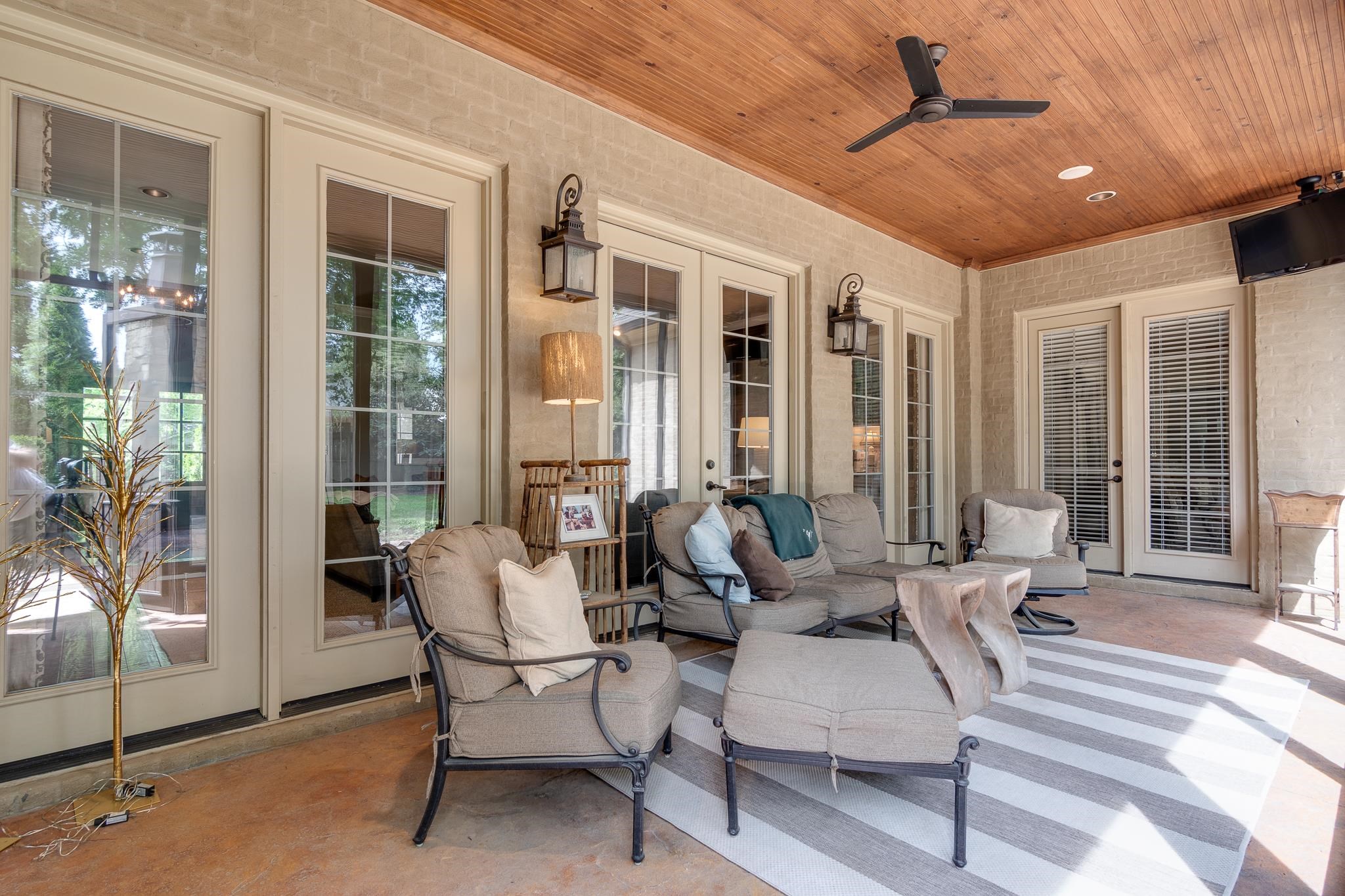 5245 Cole Road Memphis, TN 38120 - Photo 23 of 25 a living room with furniture and large windows