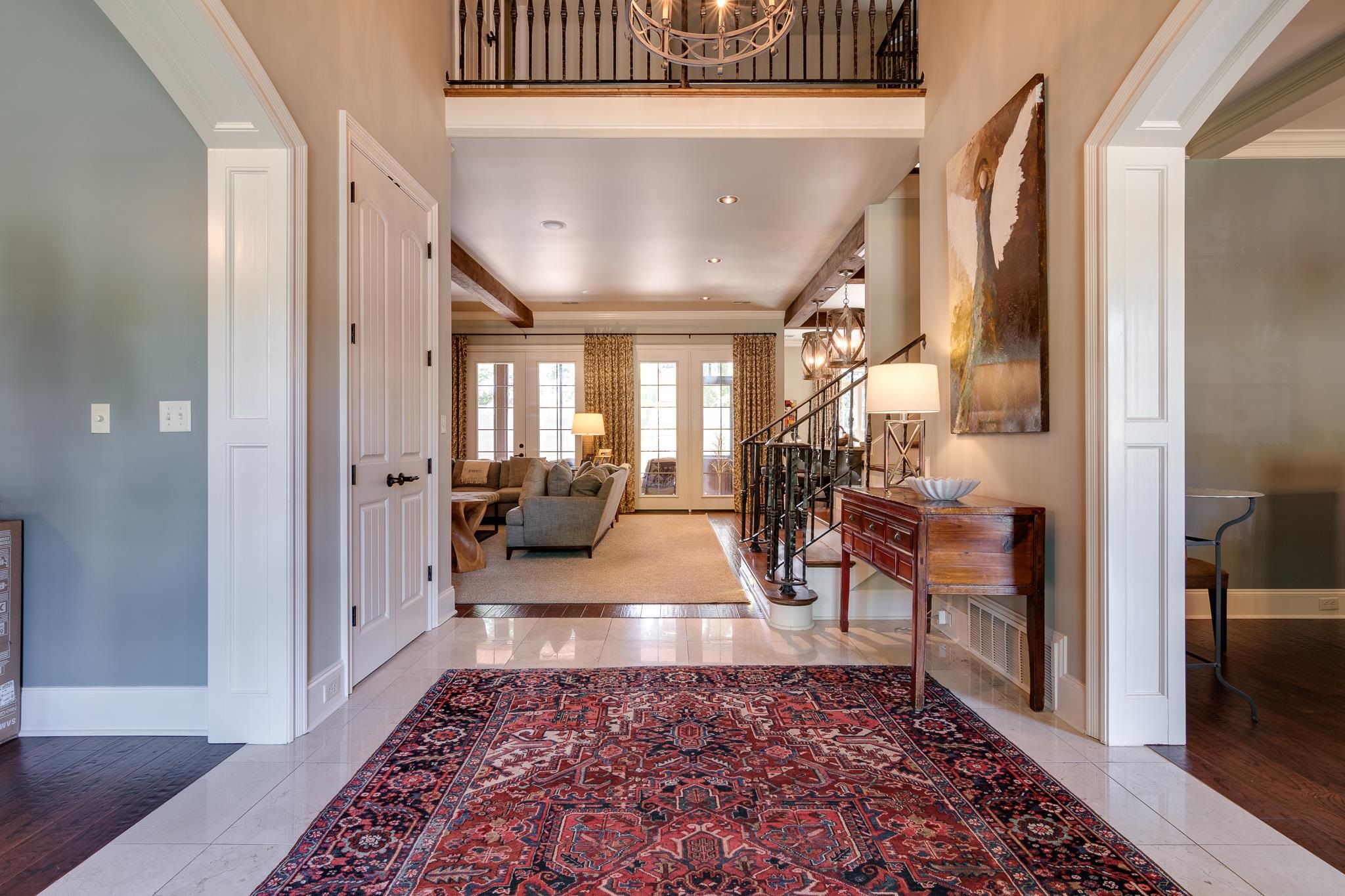 5245 Cole Road Memphis, TN 38120 - Photo 4 of 25 a view of entryway and living room with wooden floor