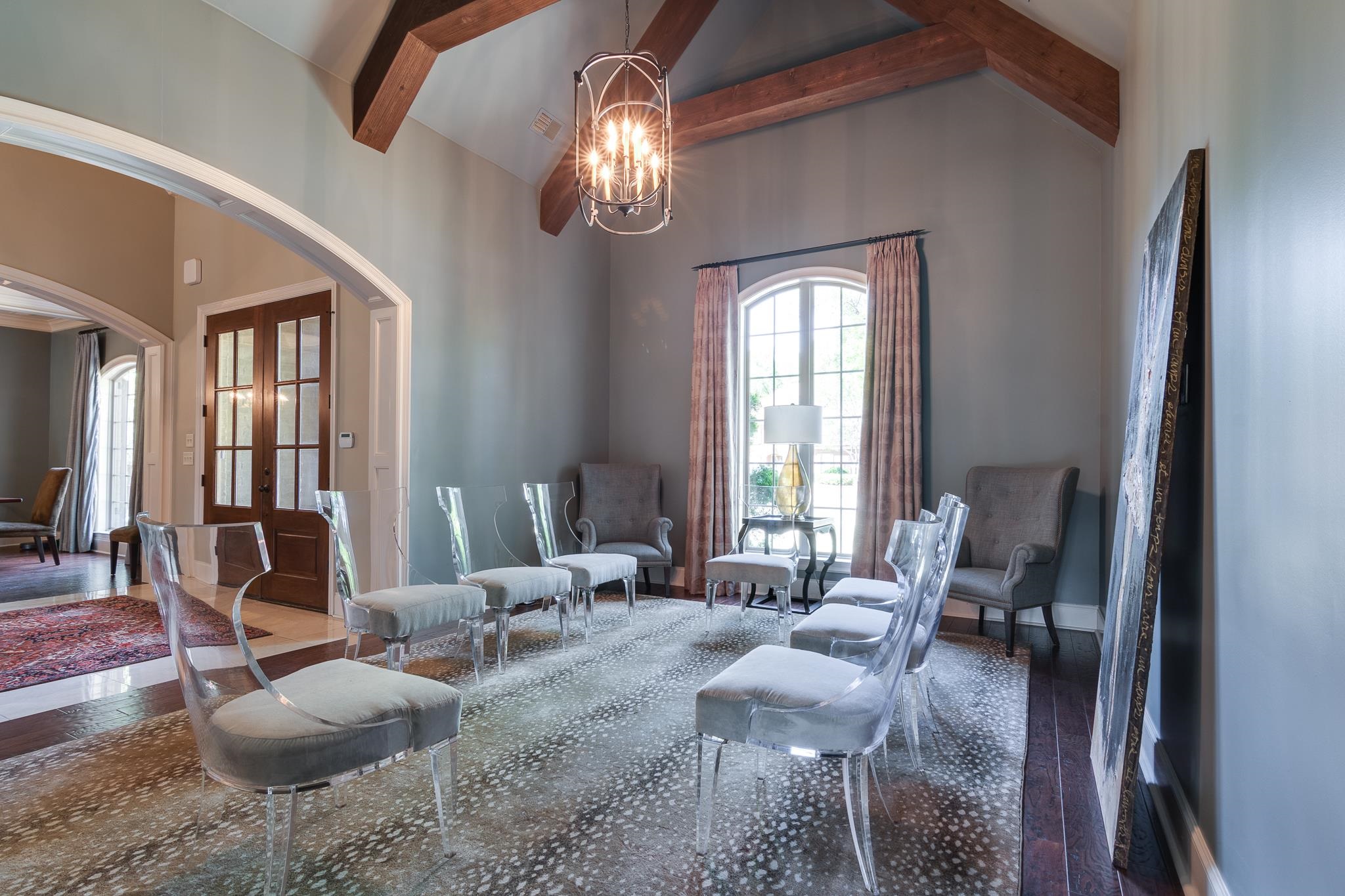 5245 Cole Road Memphis, TN 38120 - Photo 5 of 25 a living room with furniture chandelier and a large window