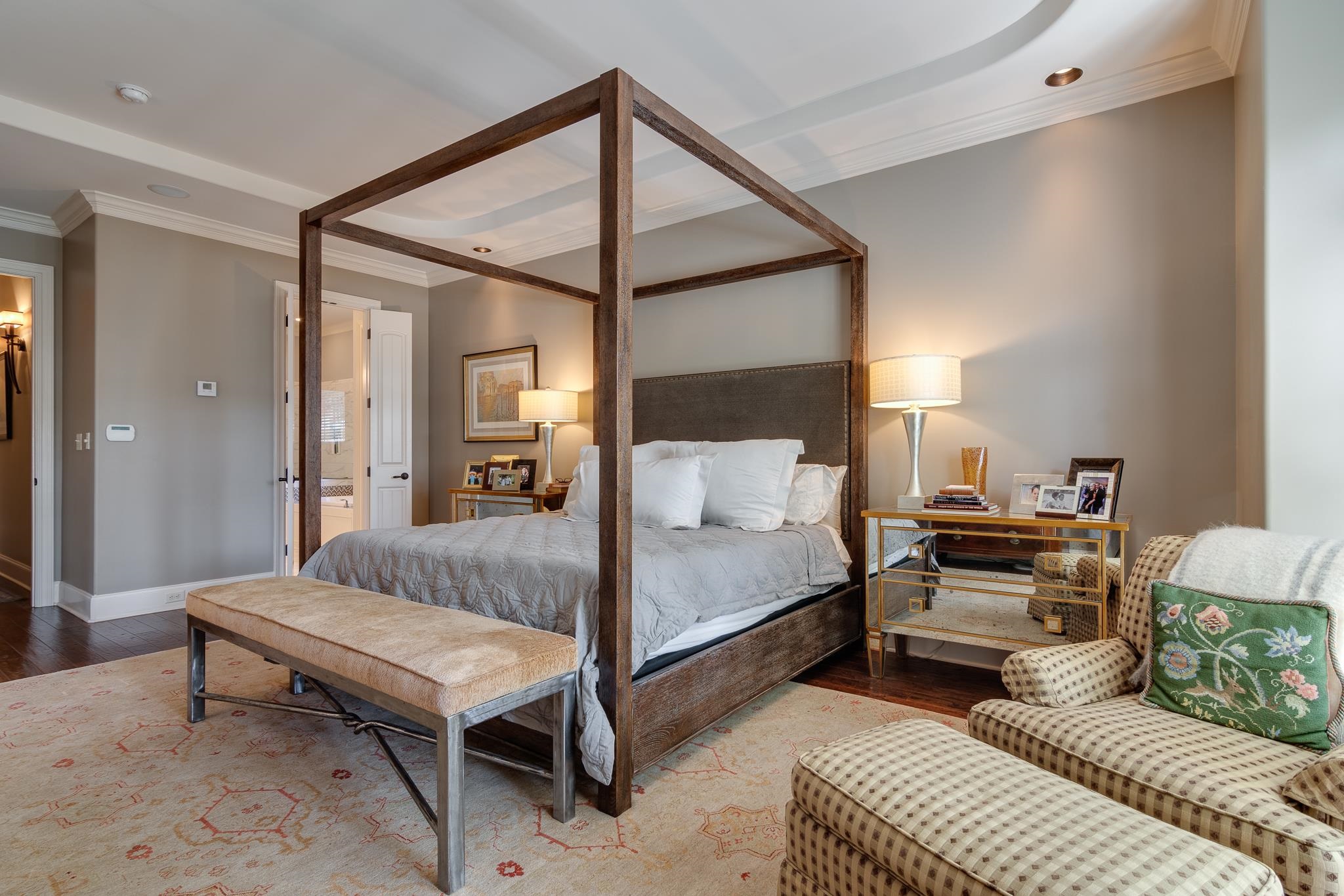 5245 Cole Road Memphis, TN 38120 - Photo 9 of 25 a bedroom with a bed and a mirror