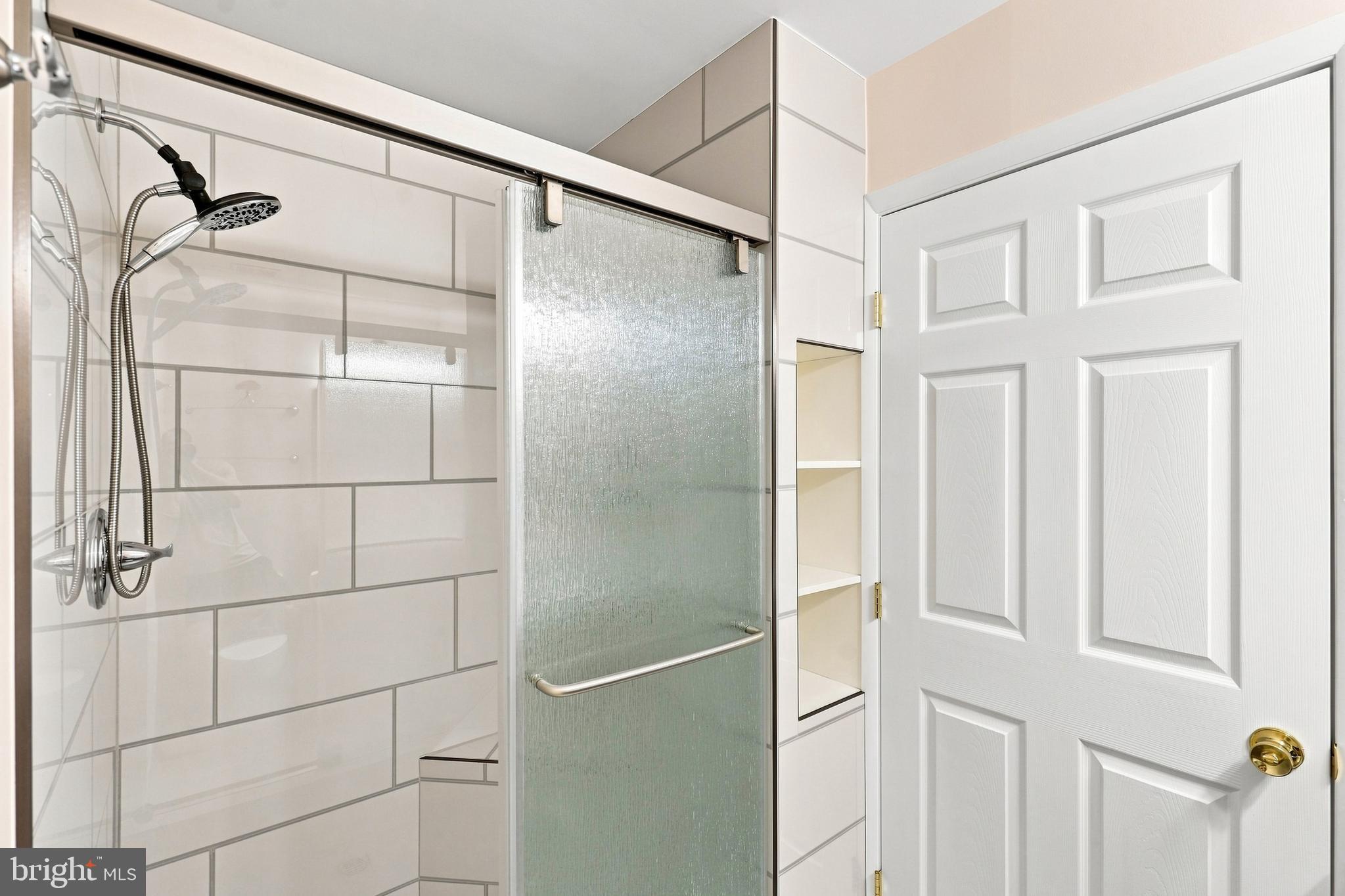 202 Arms Chapel Road Reisterstown, MD 21136 - Photo 22 of 33 Shared Bathroom with Custom Tiled Shower
