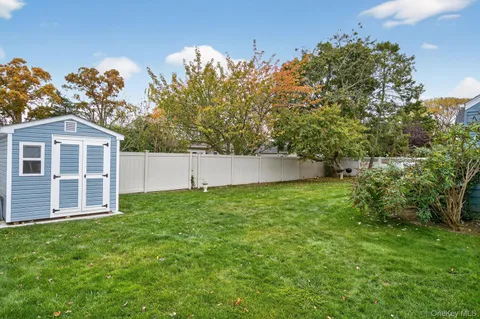 a view of backyard with green space