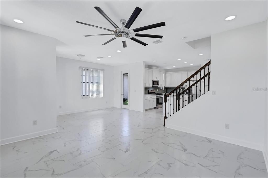 5830 Circa Fishhawk Boulevard Lithia, FL 33547 - Photo 12 of 37 a view of an entryway with wooden floor