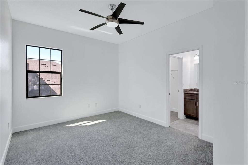 5830 Circa Fishhawk Boulevard Lithia, FL 33547 - Photo 26 of 37 an empty room with windows and closet