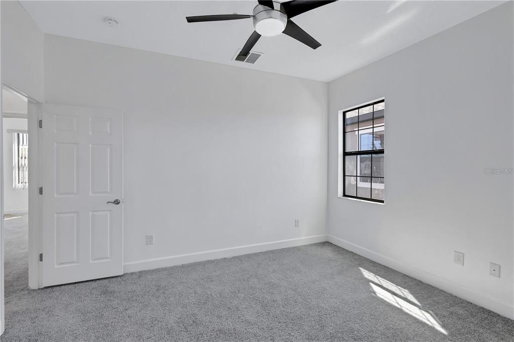 5830 Circa Fishhawk Boulevard Lithia, FL 33547 - Photo 27 of 37 a view of room with hardwood ceiling fan