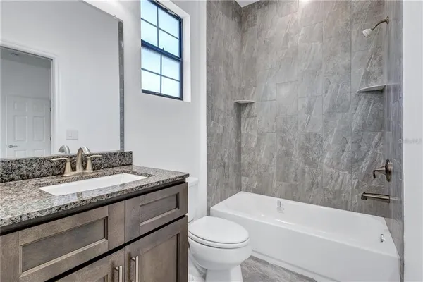 a view of a refrigerator in a kitchen