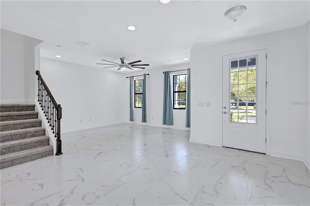 5830 Circa Fishhawk Boulevard Lithia, FL 33547 - Photo 7 of 37 a view of an empty room with a window