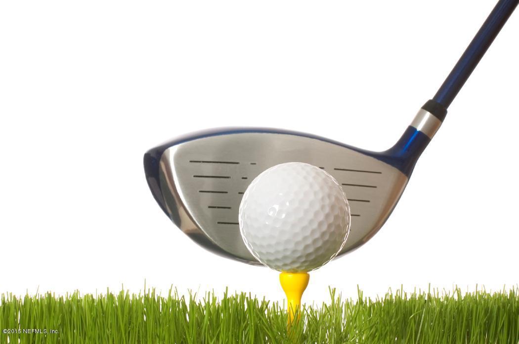 3459 D O T Road St. Augustine, FL 32084 - Photo 15 of 17 club hitting golf ball.jpg