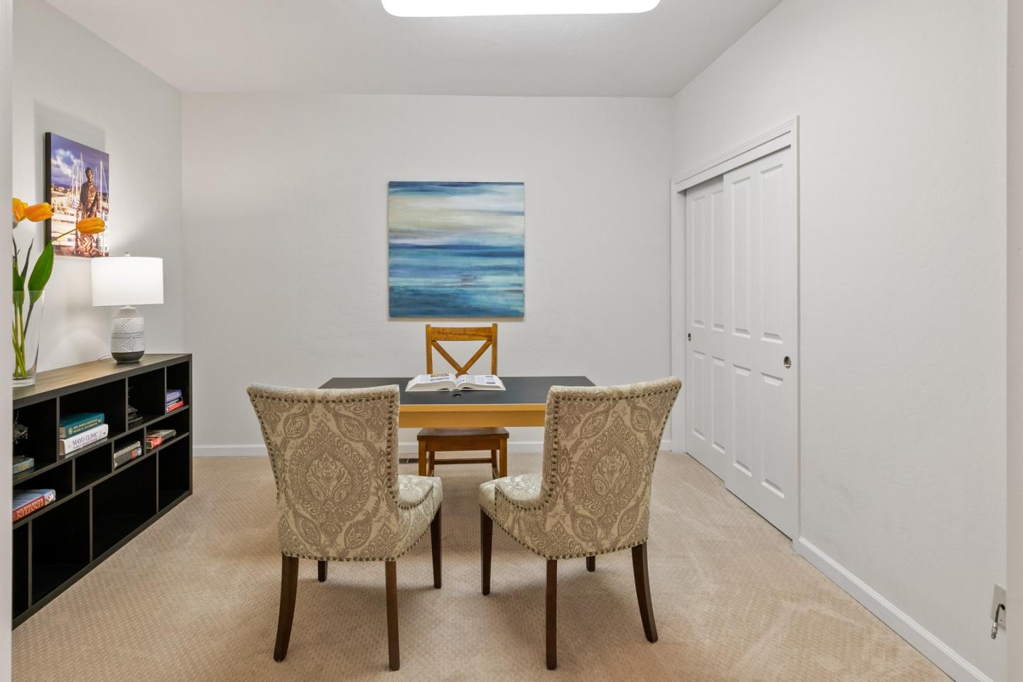 3017 Lopez Road Pebble Beach, CA 93953 - Photo 14 of 30 a view of a dining room with furniture and wooden floor
