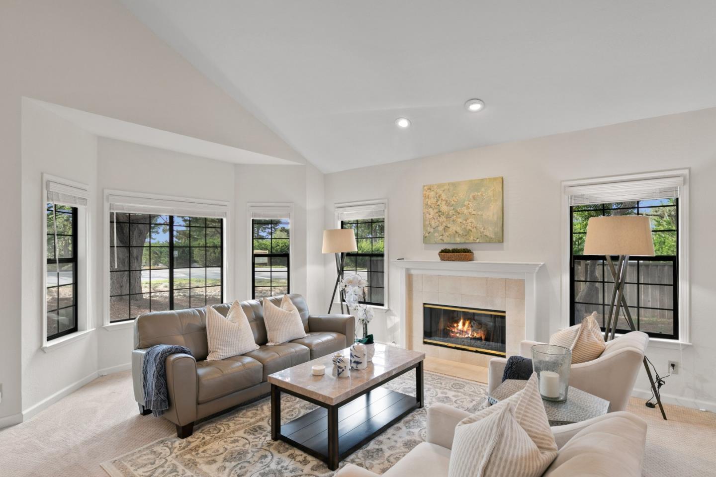 3017 Lopez Road Pebble Beach, CA 93953 - Photo 5 of 30 a living room with furniture fireplace and a large window