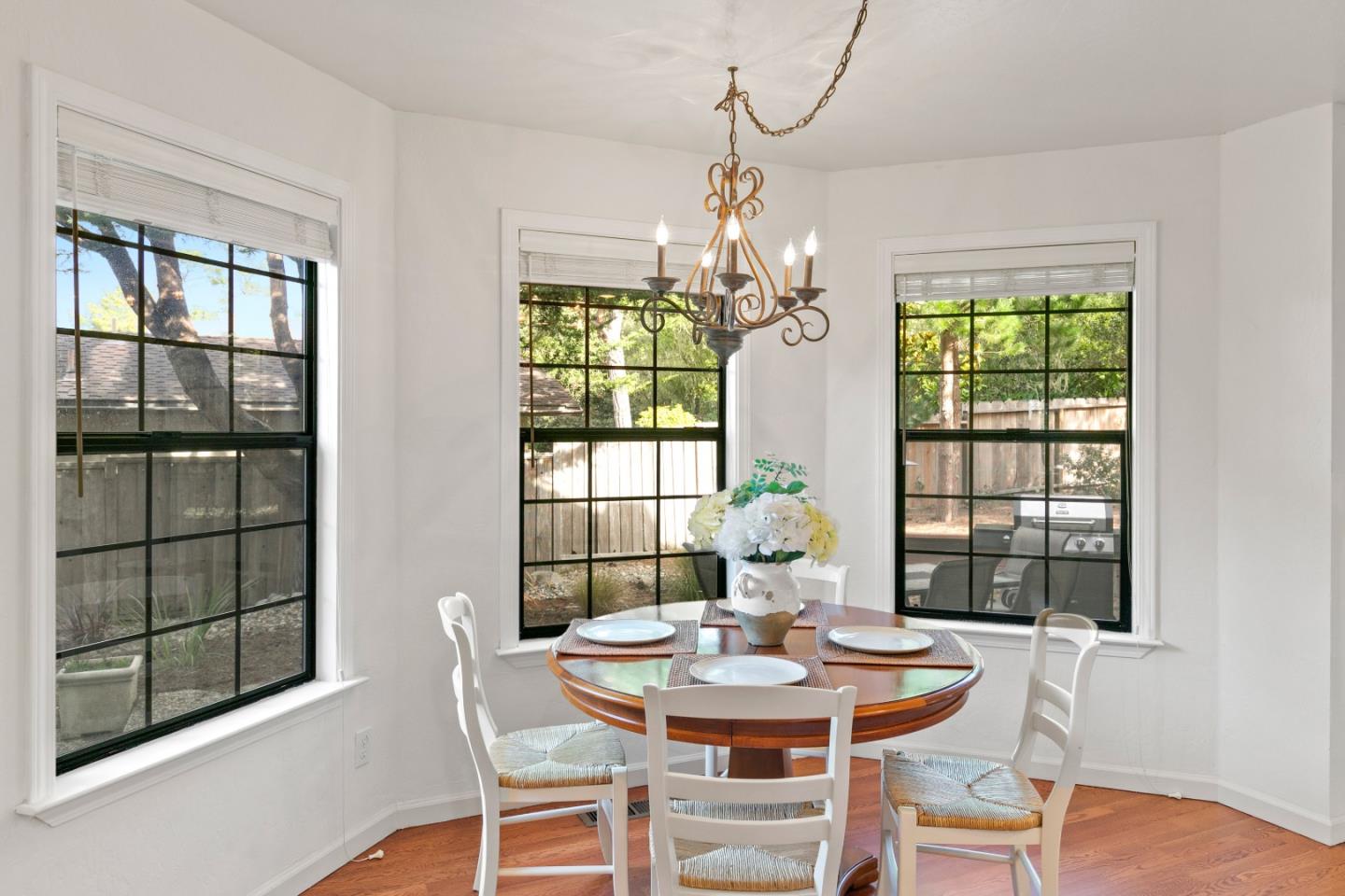 3017 Lopez Road Pebble Beach, CA 93953 - Photo 10 of 30 a view of a dining room with furniture wooden floor and chandelier