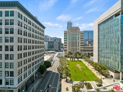 a view of a city with tall buildings