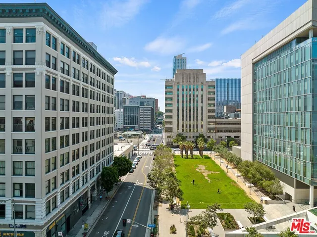 a view of a city with tall buildings