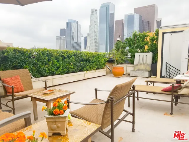 a view of a terrace with chairs