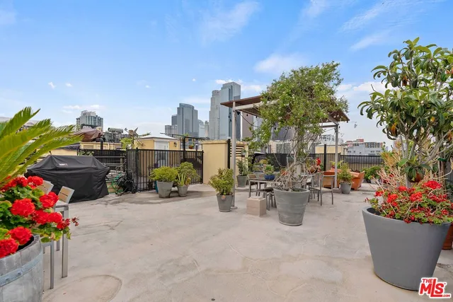 a view of a terrace with sitting area