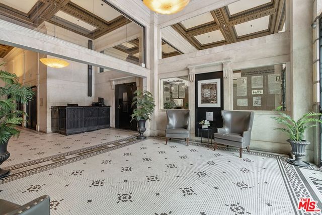 a view of house with outdoor seating space