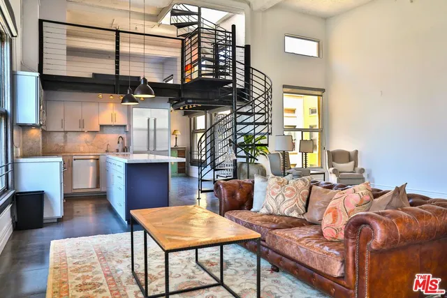 a living room with a couch and a table