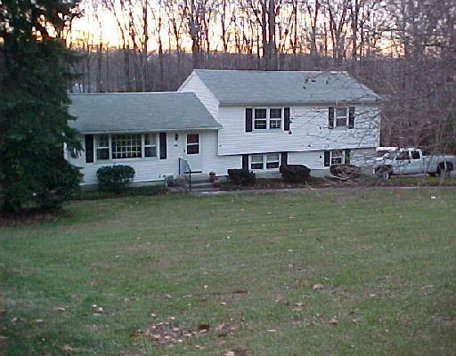 36 Ridgedale Road Bethel, CT 06801 - Photo 1 of 1 a view of a big house with a big yard and large trees