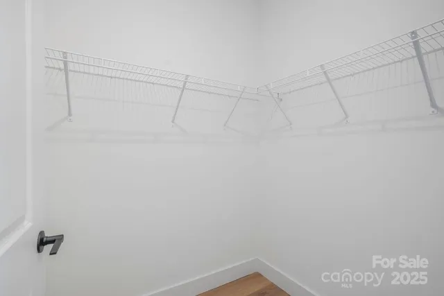 a view of a room with racks on the wall