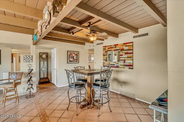 a view of a livingroom with furniture and a fireplace