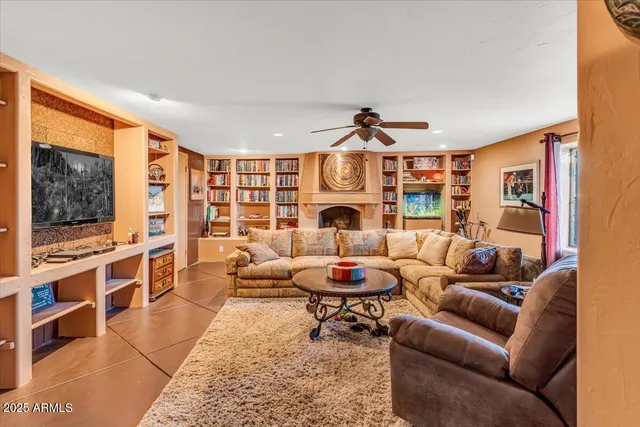 a view of a livingroom with furniture window and workspace