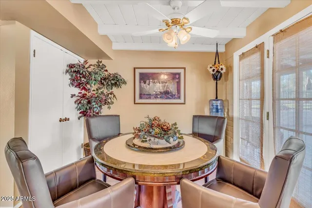 a bathroom with a sink mirror vanity and toilet