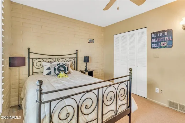 a room with a wooden floor and shoes