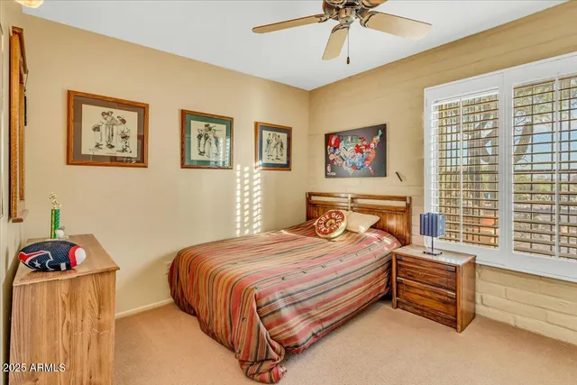 a view of a swimming pool with a yard