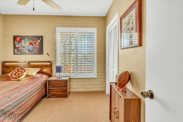 a view of a swimming pool with a yard