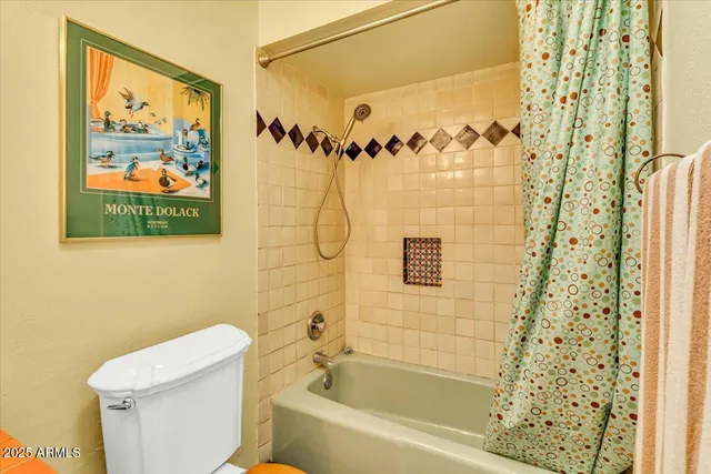 a view of living room with patio and wooden floor