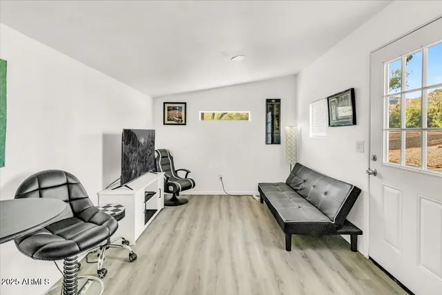 a view of street with palm trees